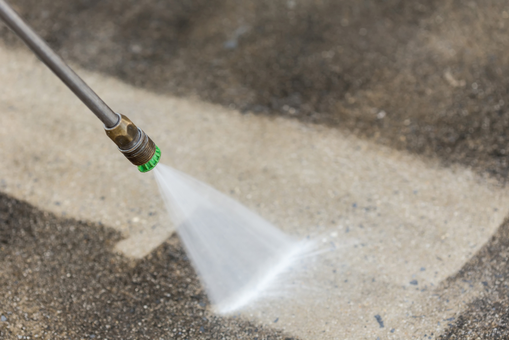 Close up Outdoor floor cleaning with high pressure water jet