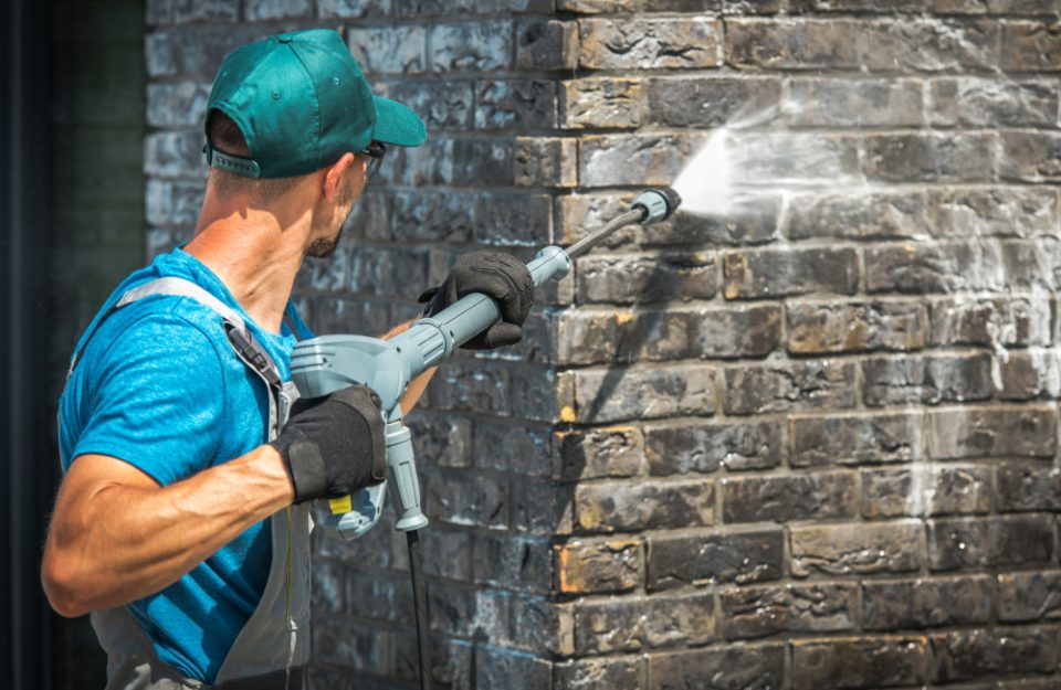 Pressure washing brick walls